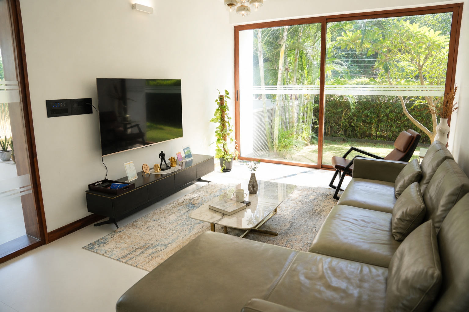 The shared living and dining room opening onto the garden